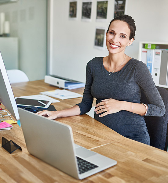 Pregnant woman working